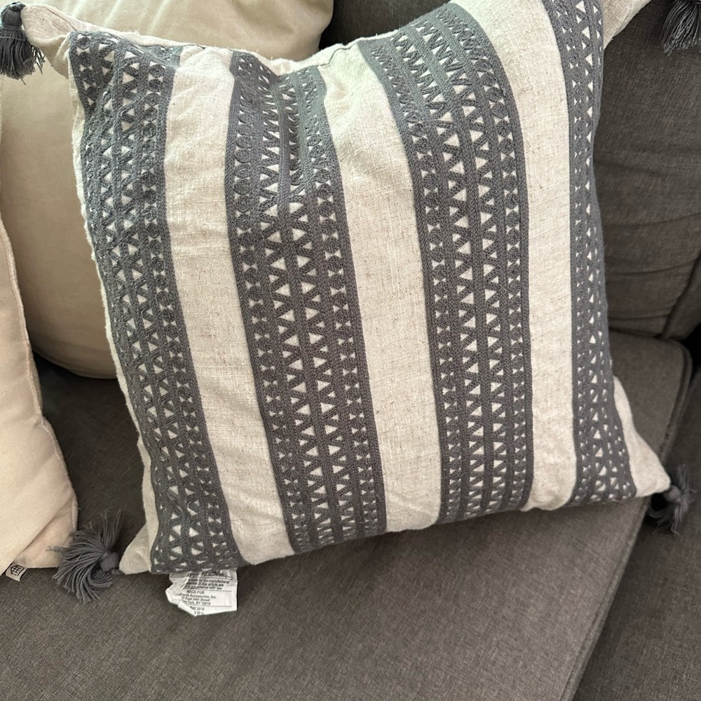 2- 19inch pillow covers - gray and cream with tassels